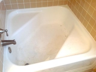Worn out garden style 4x4 bathtub.