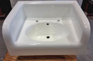 Bath farm sink refinishing restored with the TubPotion coating system.