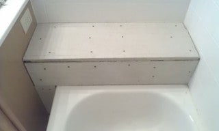 Bathroom ceramic tile repair regrouting.