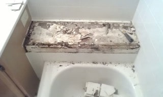 bathroom ceramic tile repair. Tile lifted when water got into the drywall.