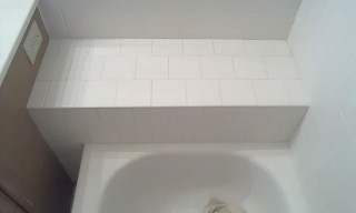 Completed bathroom ceramic tile repair.