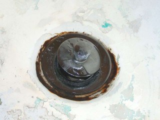 Rusted tub drain fix