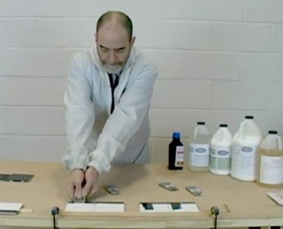 Applying a razor to test TubPotion process and coatings.