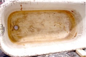 Antique clawfoot tub showing its age, these require several hours of additional prep work.