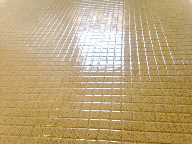  Bathroom Remodeling After Bath renovation: Ceramic floor tile refinished in Multi-stone.