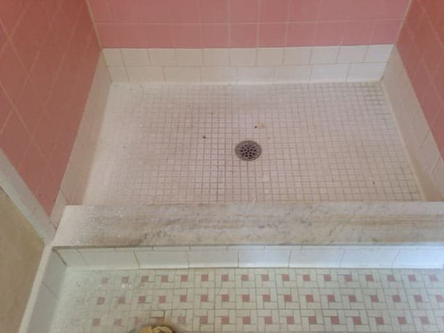 BEFORE: Ugly out-dated pink floor & walls. Ceramic tile refinishing