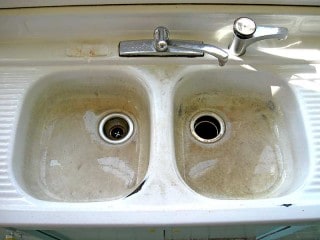 Kitchen sink repair - discolored and chipped.