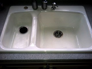 Kitchen sink refinished in a home.