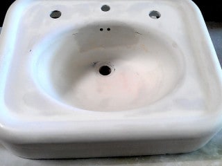 Pedestal sink refinishing - getting the body work done.